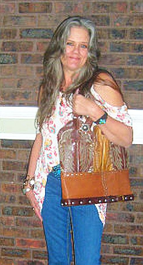 Cowboy Boot Laptop Tote LT24 handcrafted from cowboy boots. Shop Handbags at ChrisThompsonBags.com and buy the best boot purse, cowboy boot purse, cowgirl handbag, leather laptop tote, recycled cowboy boots, unique gift for her, unique gift for him, unique travel bag, western diaper bag, western laptop tote, western travel bag, XL cowboy Boot Purse, XL leather tote at Chris Thompson Bags.